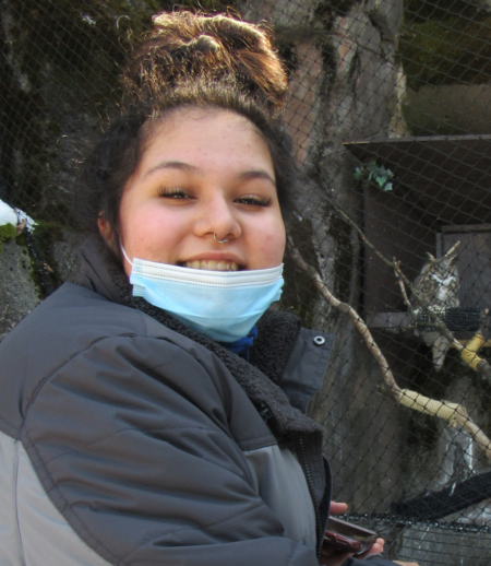 Image of a woman outside with a facemask on